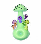 King Pluto 4-inch glass handpipe featuring a light green mushroom design with colorful decorative toadstools.