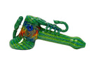 King Pluto PLBUB1 STING glass pipe with green and blue swirl pattern and a sculpted scorpion design.
